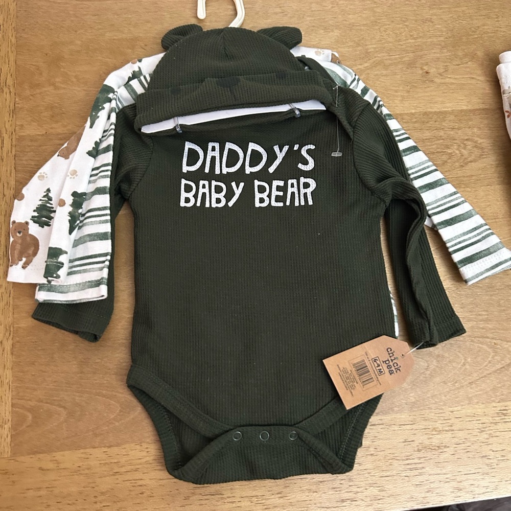 Brand new BOYS body suits 6-9 months